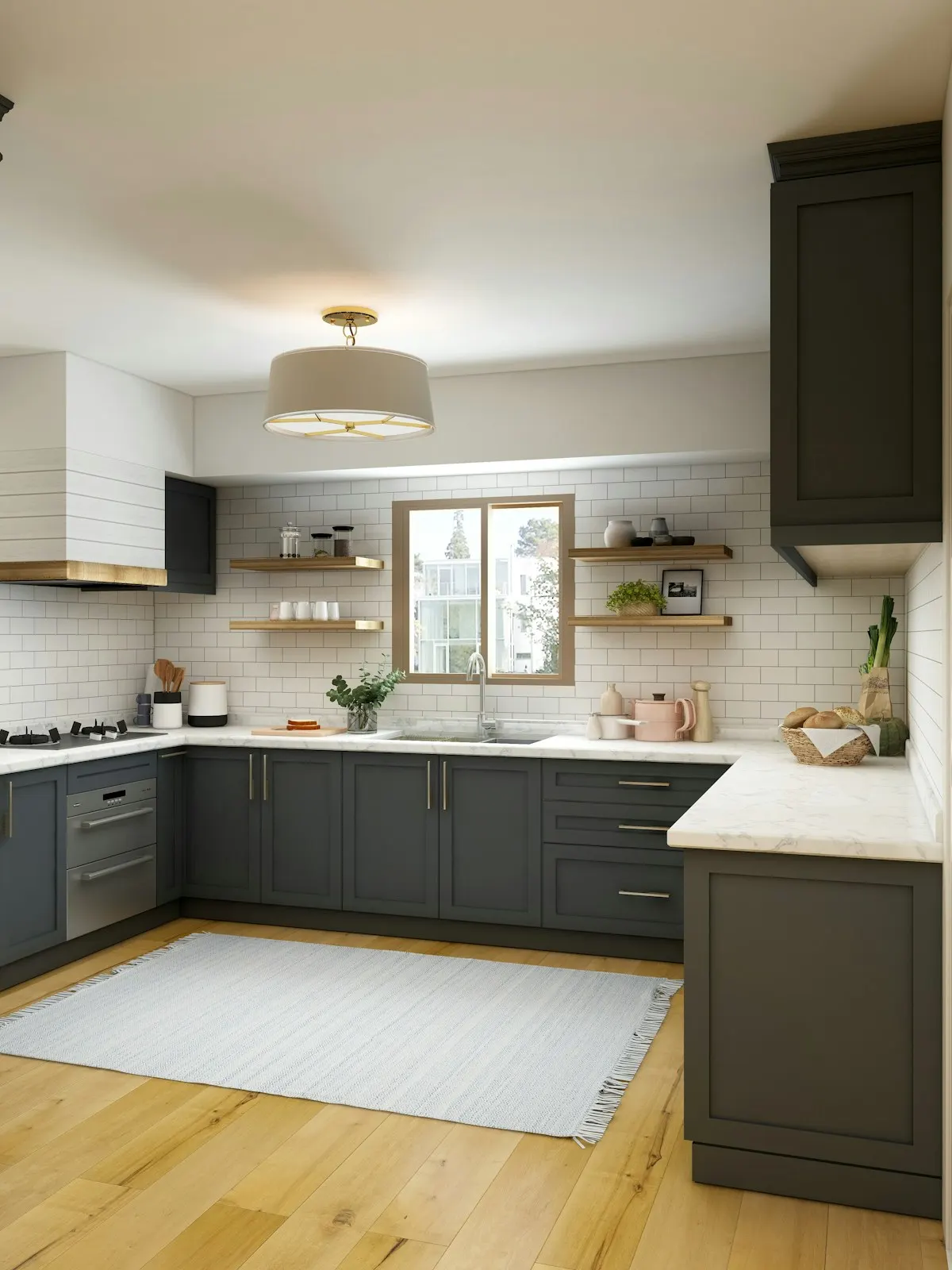 Compact kitchen with dark base cabinets and a window over the sink