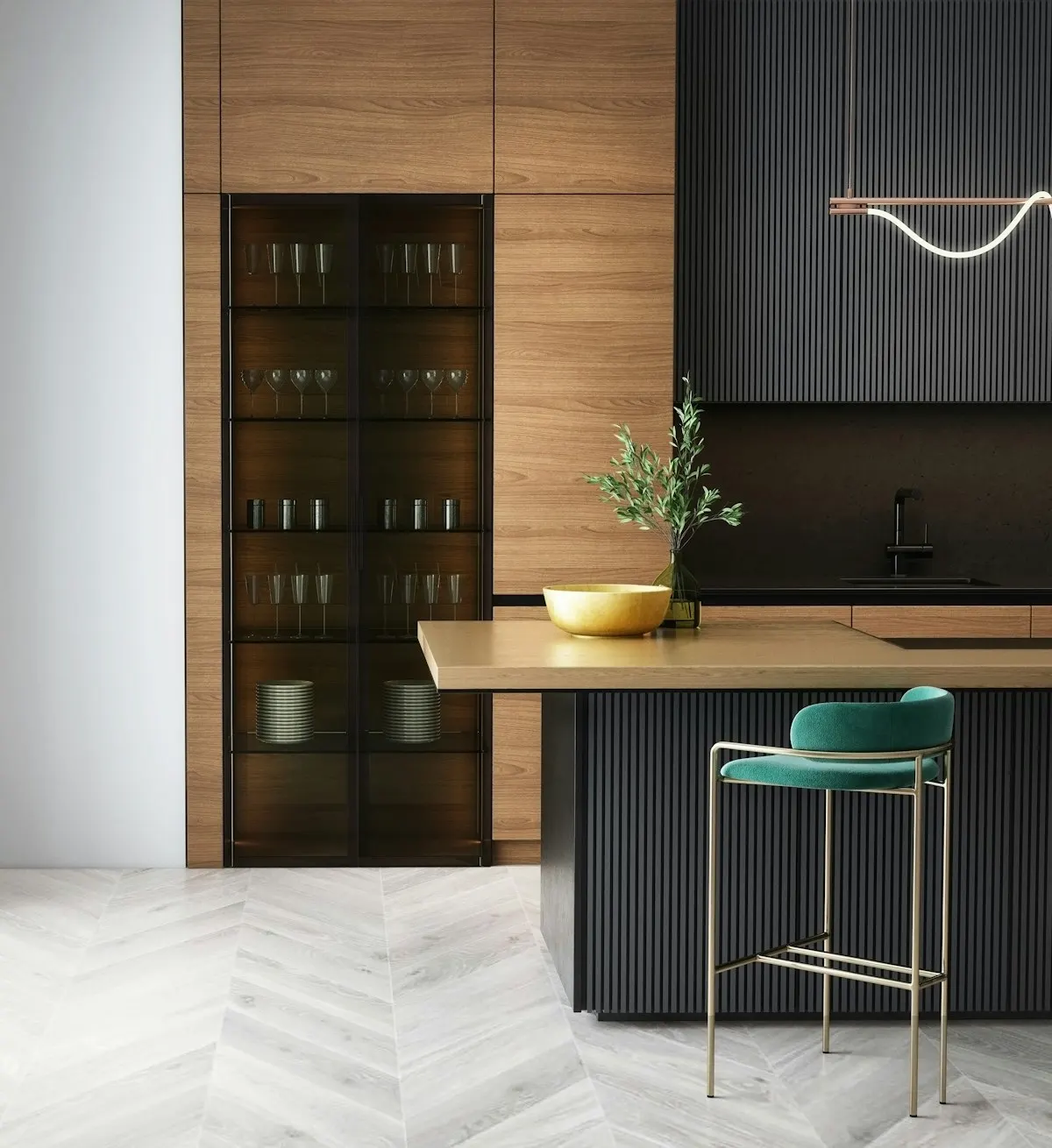 Dark kitchen island beneath a sculptural pendant light