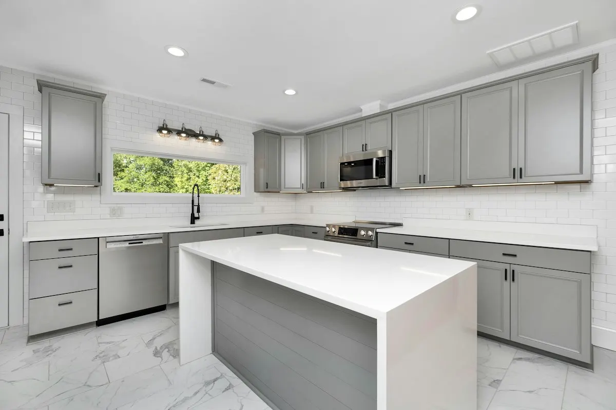 Grey kitchen with a rectangular central island